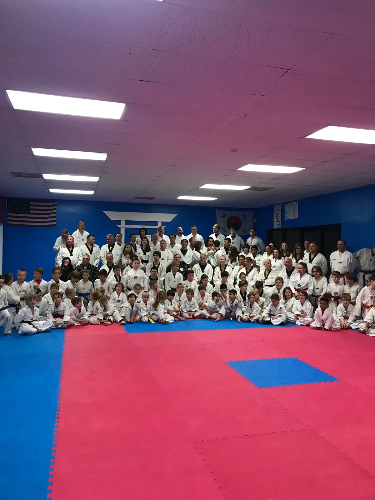A large group of students and family members in our dojang